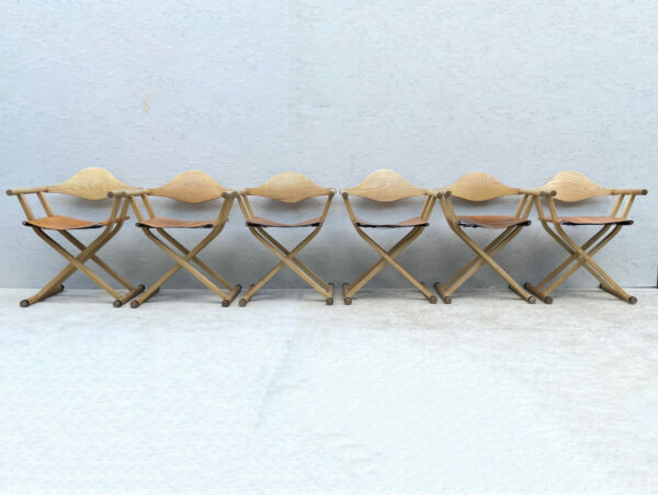 A Set Of 6, 1980's David Colwell, C2 Folding, Directors Chairs, Steam Bent Ash And Tan Leather