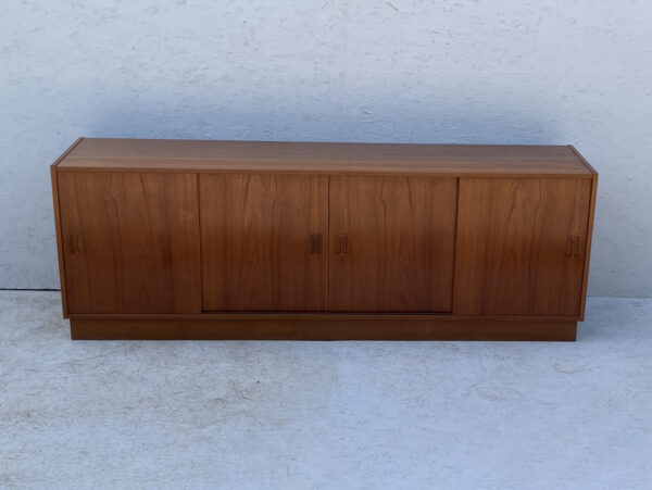 Mid Century Danish, Plinth Based Sideboard In Teak With Sliding Doors - Image 2