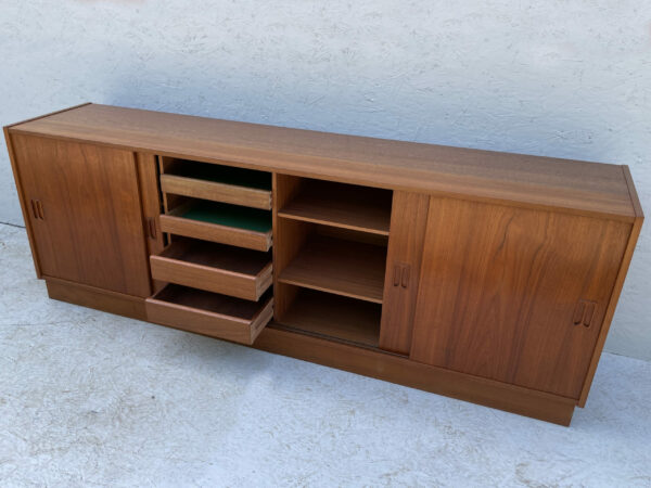 Mid Century Danish, Plinth Based Sideboard In Teak With Sliding Doors - Image 9